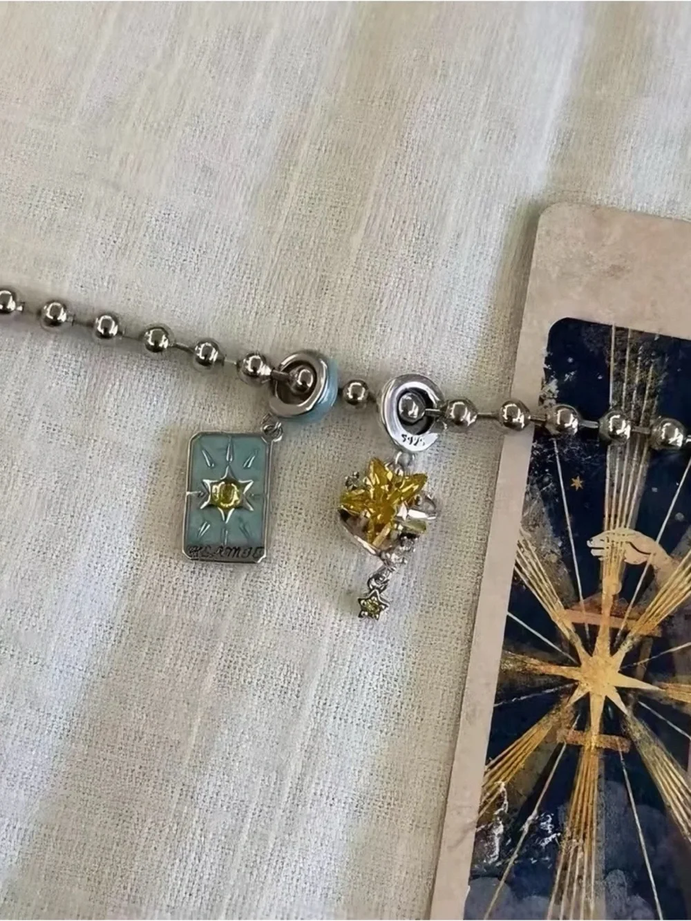 Anthropologie Silver Charm Bracelet with Blue and Cream Enamel Accents